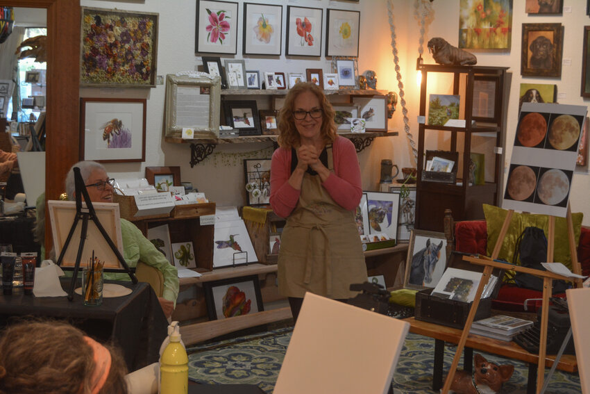 Andrea Levanti greets her Paint &amp; Sip class at InGenius! Gallery &amp; Boutique on Sept. 29. InGenius! is hosting a nature-focused community art show from Saturday, April 13 to Saturday, April 27.