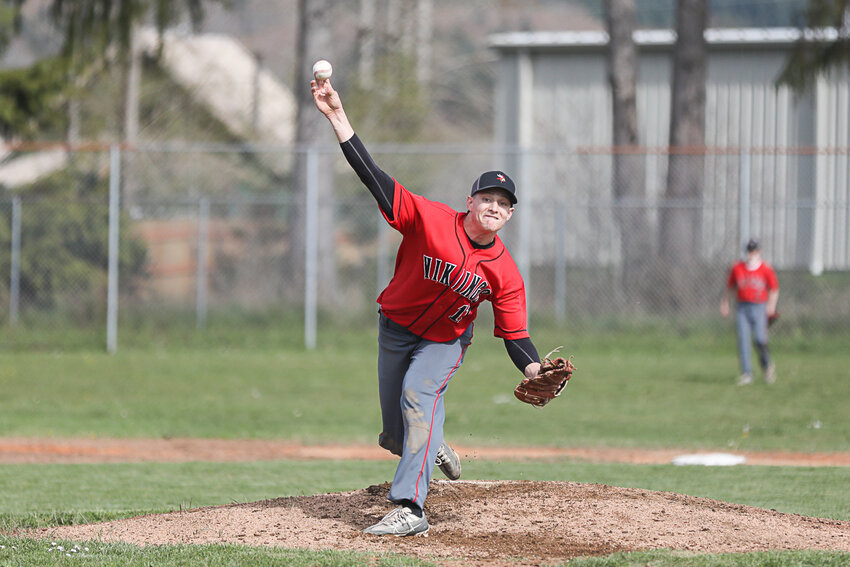 Easton Kolb throws a pitch during Mossyrock's loss to Pe Ell-Willapa Valley on March 29.