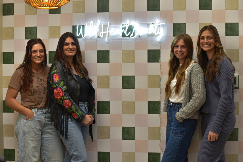 Members of Wild Heart Beauty, Tayelyn Cutler, Pepsy Mcgill, Presly Littlejohn and Brooklyn Cutler, pose for a photo in the new salon.