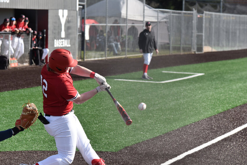 Outfielder Barrett Schnetz swings his bat and nearly connects the barrel to the baseball on Tuesday, March 12, against Kennedy Catholic.