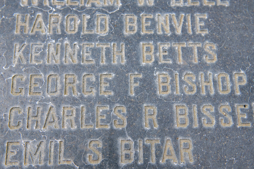 The name of George F. Bishop is displayed on the Freedom Walk War Memorial at George Washington Park in Centralia on Thursday, April 4. Relatives of Bishop are asking the public to assist in finding a photo of Bishop, who died during World War II. His remains were identified last year.