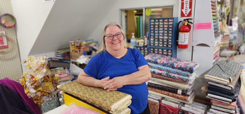 Susan Engelking, owner of Country Manor Fabrics in Battle Ground, has sewn, repaired and cared for many quilts since opening her store in 1985.