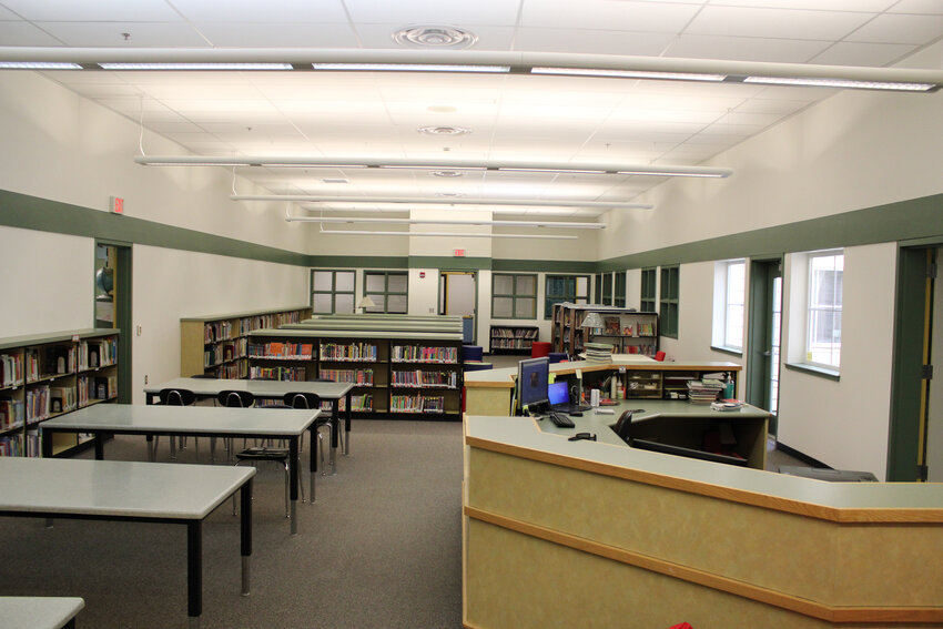 Rainer Elementary School's library now sports a green and white paint job after 20 years of blue, yellow and white.