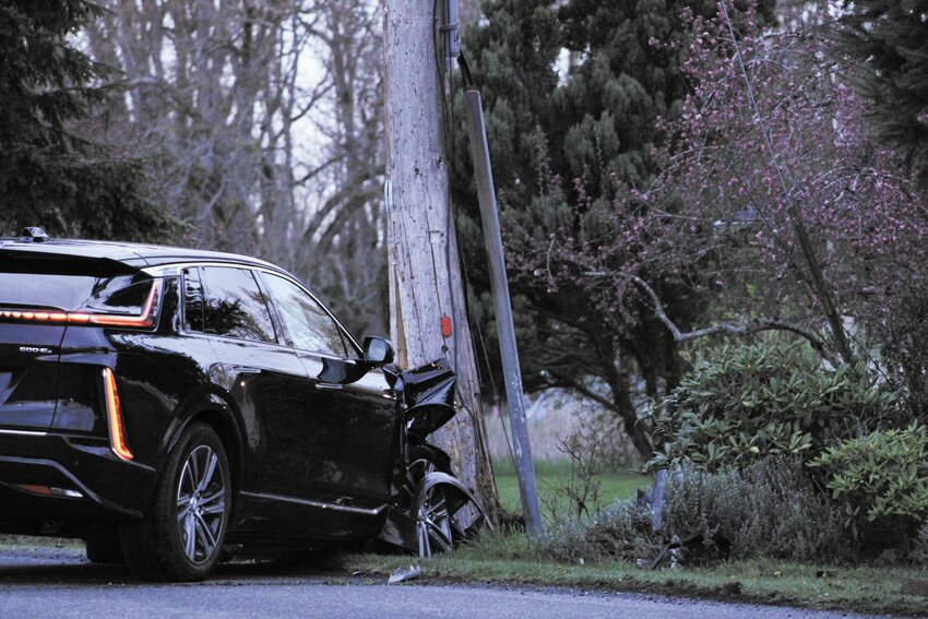 A Chrysler LYRIQ is left smashed into a power pole after a man suspected of driving under the influence crashed on West Street SE in Yelm on April 5.