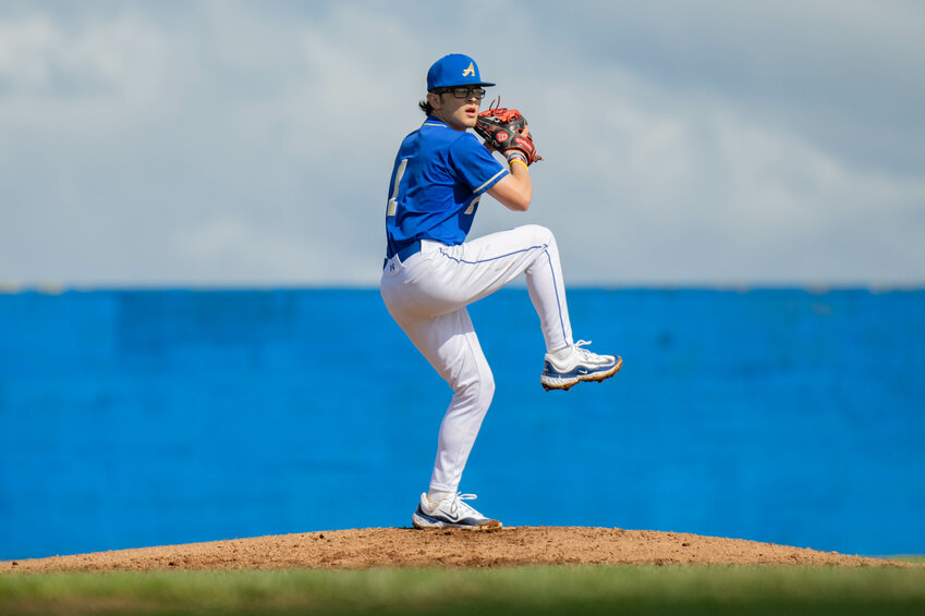 Tristan Percival winds up to throw a pitch during Adna&rsquo;s win over Toledo on April 9.
