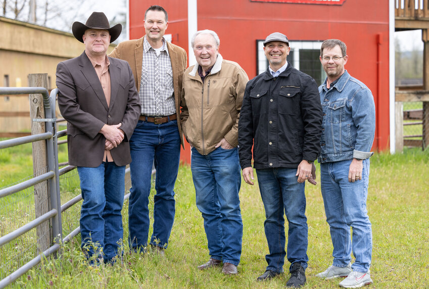 From the left, Lewis County Commissioner Scott Brummer; Lewis County Parks and Recreation Administrator B.J. Kuykendall;  Southwest Washington Fair Association President Jerry Owens; state Rep. Peter Abbarno; Southwest Washington Fair Advisory Board Acting Chair George Dodd pose for a photo at the Southwest Washington Fairgrounds on Monday, April 8. The group met to discuss future improvements to the horse arena.