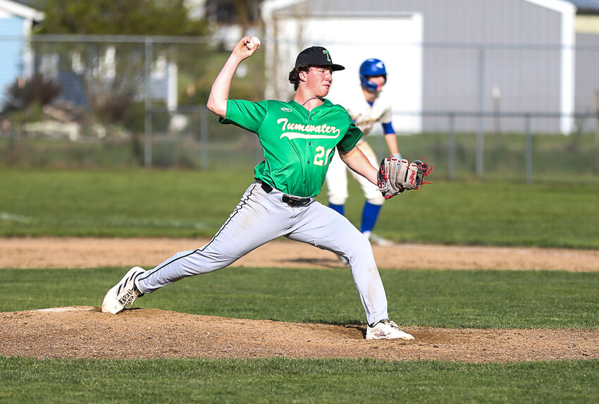 Tumwater's Derek Thompson fires a pitch against Rochester during an Evergreen Conference game on April 10 at Rochester.
