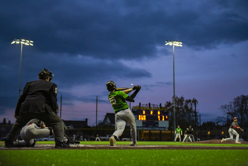 Jimmy Womach hits a ball to the outfield during Tumwater&rsquo;s win over W.F. West at Centralia College on Monday, April 15.