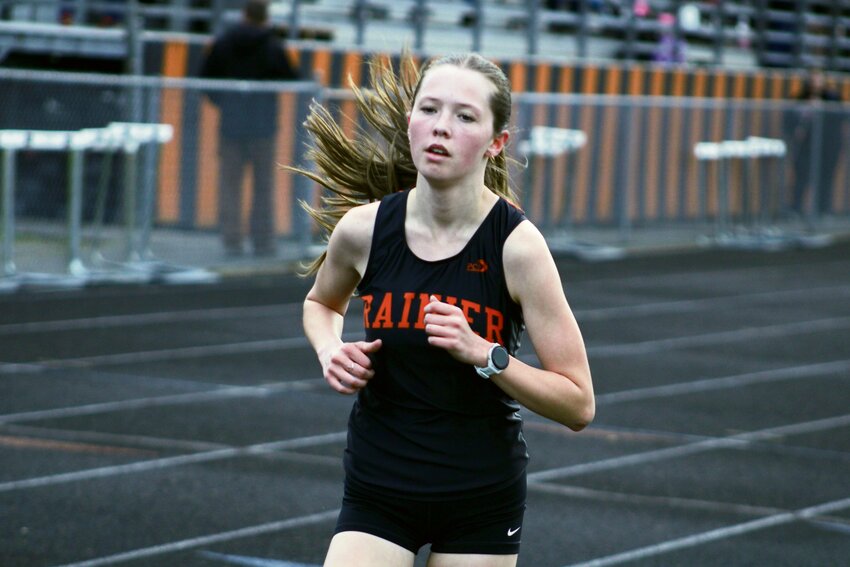 FILE PHOTO &mdash; Rainier's Madison Ingram heads to the finish line during a race on March 21.