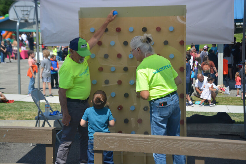 A young Yelm resident plays a variation of &ldquo;Plinko&rdquo; at last year&rsquo;s Prairie Days.