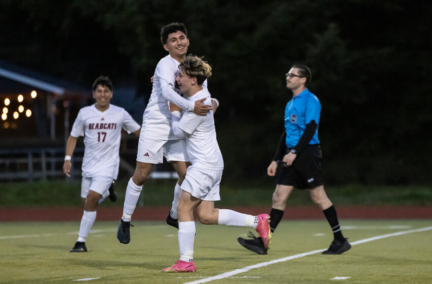 W.F. West&rsquo;s Rafa Mendez and Alex Mathuzime celebrate Mendez&rsquo;s goal to make the score 2-1 during a soccer game at Tumwater High School on Tuesday, April 16.