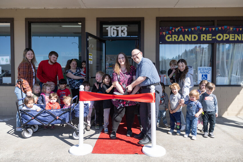 Owners Tina, left, and Steven Kendall cut the ribbon at the re-opening of Valued Kids child care center in Centralia on Friday, April 19. Valued Kids is located at 1613 Grand Ave. in Centralia. The center can be contacted by email and phone at valuedkids@gmail.com and 360-736-4000. Friday&rsquo;s ribbon-cutting ceremony was hosted by the Centralia-Chehalis Chamber of Commerce.