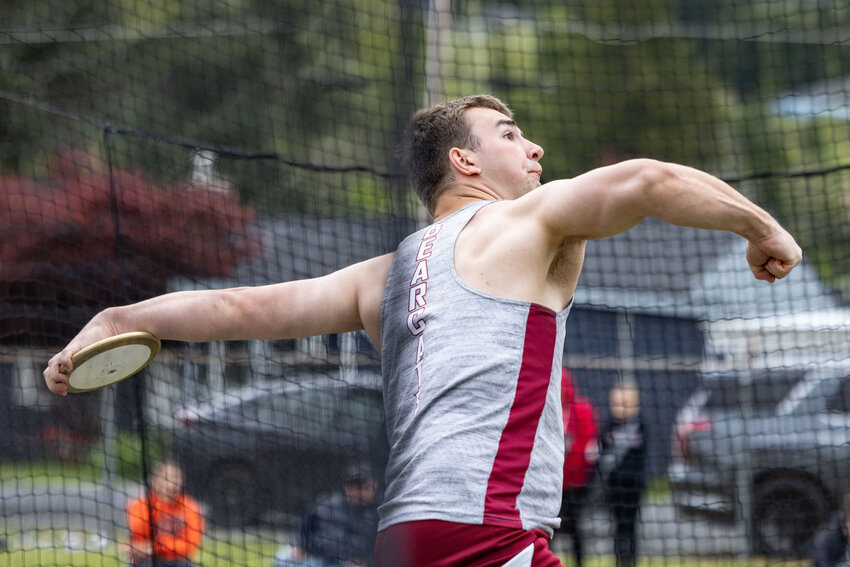 W.F. West&rsquo;s Caleb Busse throws the discus during the Chehalis Activators Classic at W.F. West High School on Saturday, April 20.