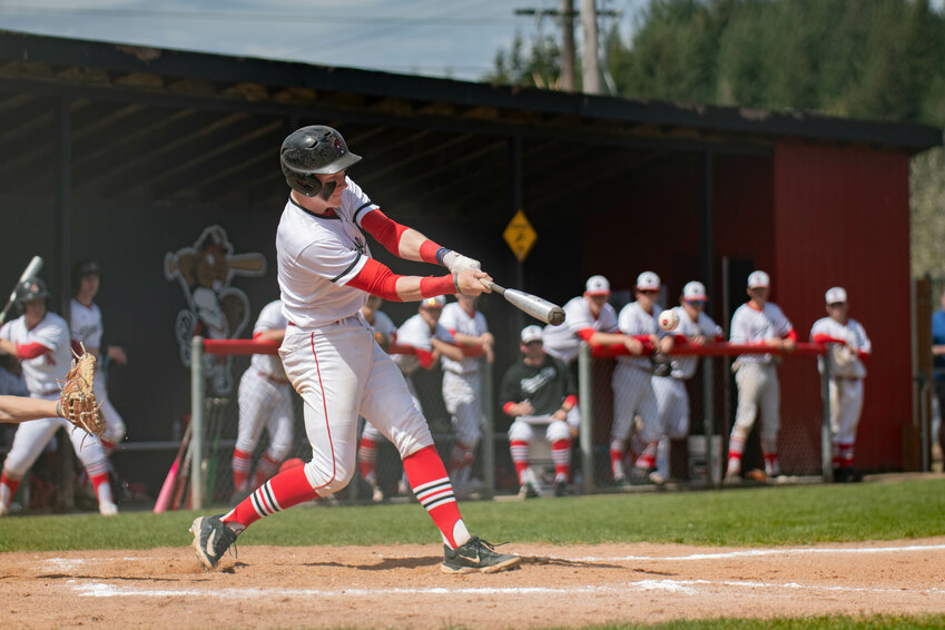 Austin Gonia hits a line drive during Tenino&rsquo;s game versus Montesano on Saturday, April 20.