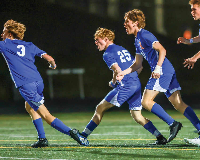 The Spudders celebrate the game-winning extra-time goal scored by Carson Young, No. 25, to beat the Woodland Beavers, 1-0, on Wednesday, April 17.