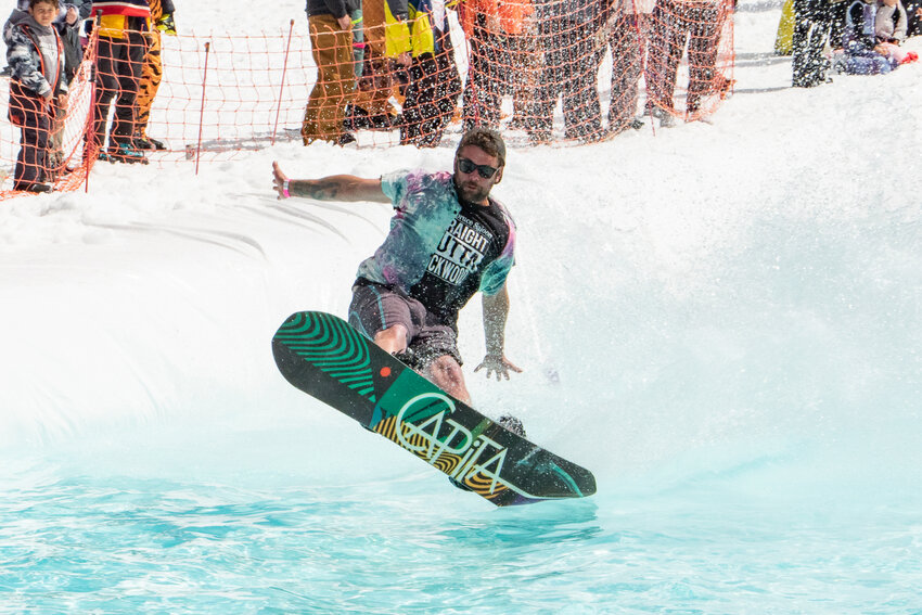 While those attempting a pond skim are encouraged to lean back, leaning back too much can have suboptimal results as this snowboarder discovered on Saturday, April 20, at the 2024 White Pass Ski Area Pond Skim.