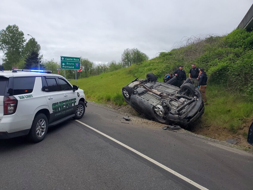 A Portland man who had been arrested by federal agents stole their car and then led police on a chase into Cowlitz County until he crashed, causing the car to flip onto its roof, officials said.