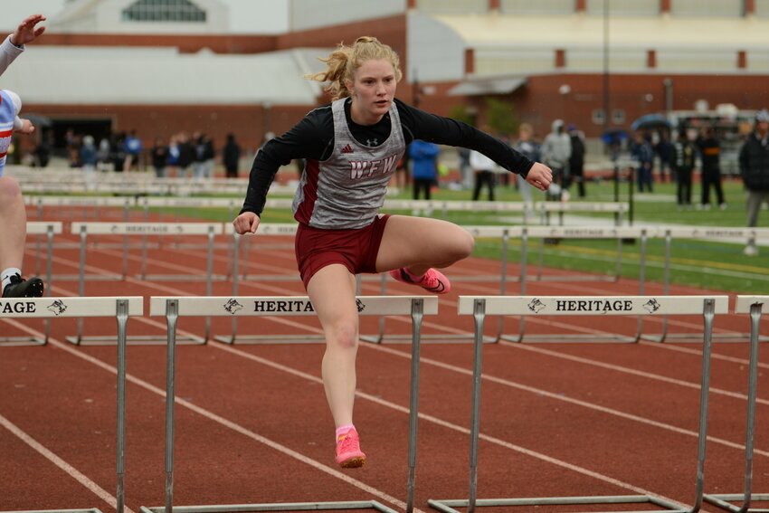 W.F. West&rsquo;s Emily Mallonee runs the 300 hurdles in a track meet Saturday in Vancouver.