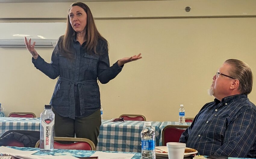 Jaime Herrera Beutler speaks at the Chehalis Eagles Club Annex during a meet-and-greet event organized by the Conservative Coalition of Lewis County as Frank Corbin looks on.