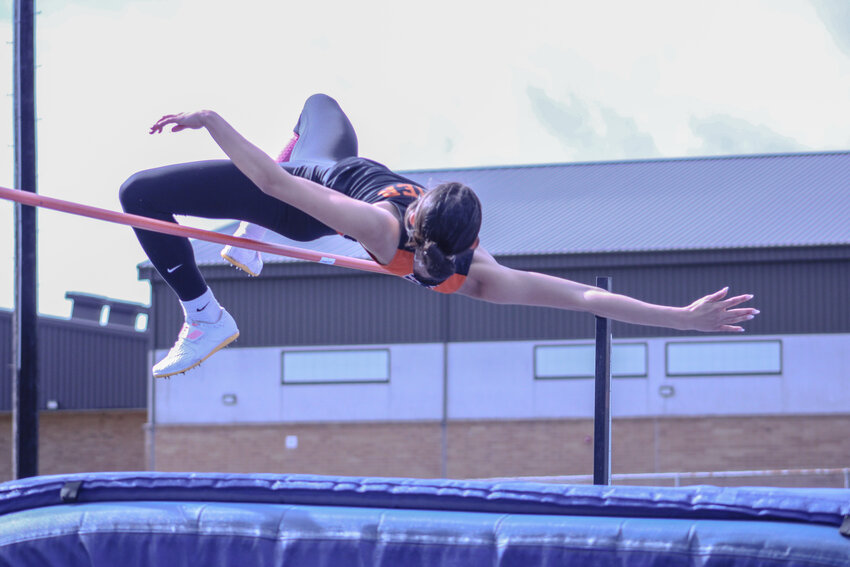 Acacia Murphy attempts the high jump in a league meet on April 30.