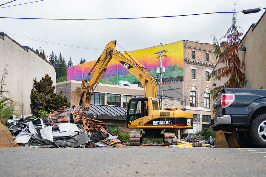 The old Wells Fargo Bank drive-thru in downtown Chehalis is demolished on Monday, April 29.