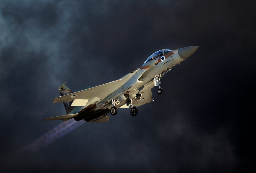An Israeli F-15 E fighter jet takes off during an air show as part of the graduation ceremony of Israeli pilots at the Hatzerim air force base in the southern Negev desert, near the city of Beersheva, on June 25, 2015.