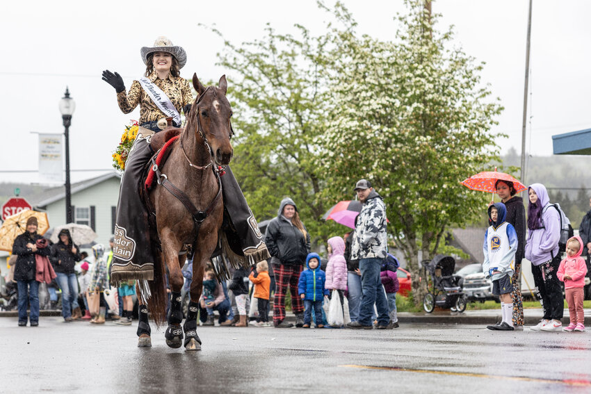 Miss Thunder Mountain Queen Taylre Byford rides her horse during the May Day parade in Vader on Saturday, May 4.