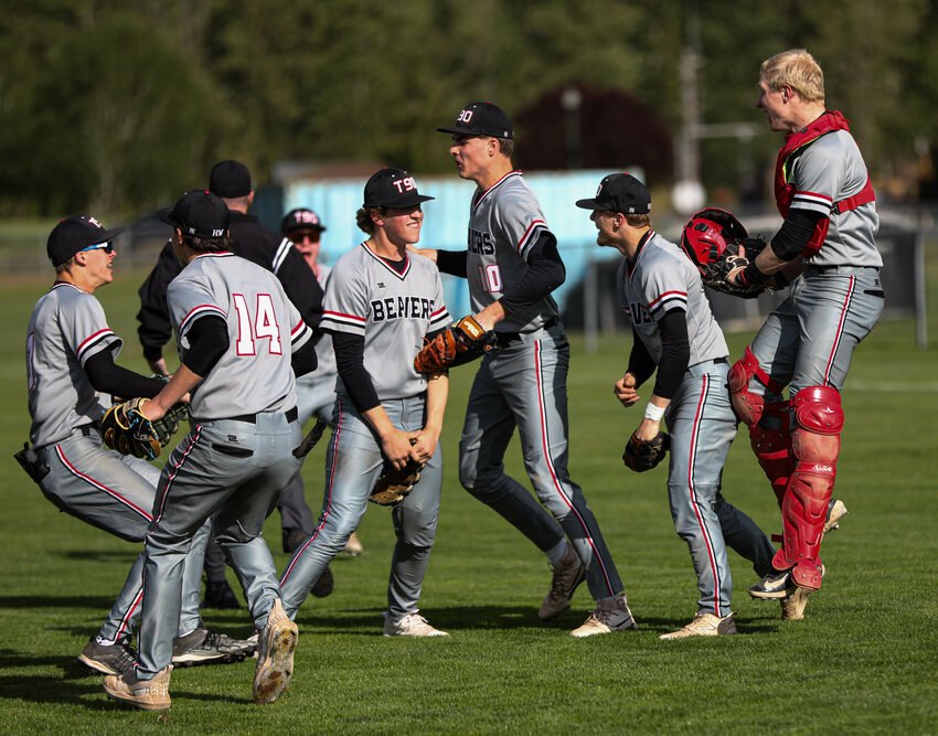 Members of the Tenino baseball team celebrate its 3-1 win over La Center in a Class 1A District 4 semifinal on Tuesday at Castle Rock High School.