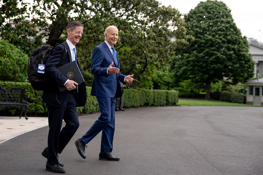 WASHINGTON, DC - MAY 8: U.S. President Joe Biden accompanied by Deputy Chief of Staff Bruce Reed (L) reacts to reporters shouted questions as he walks to Marine One on the South Lawn of the White House on May 8, 2024 in Washington, DC, for a short trip to Andrews Air Force Base, Maryland.