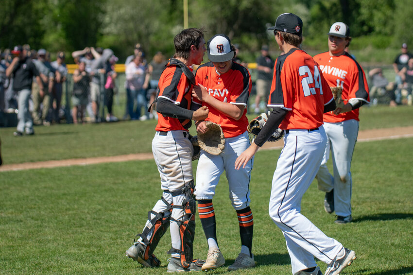 Ashton Demarest and Cal Bullock celebrate after Napavine&rsquo;s district elimination game win over Toledo at Adna High School on Thursday, May 9.
