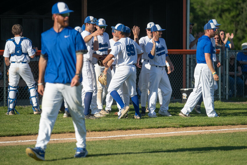 Duck players celebrate after Toutle Lake&rsquo;s win over Adna in the District 4 Championship at Napavine High School on Friday, May 10.