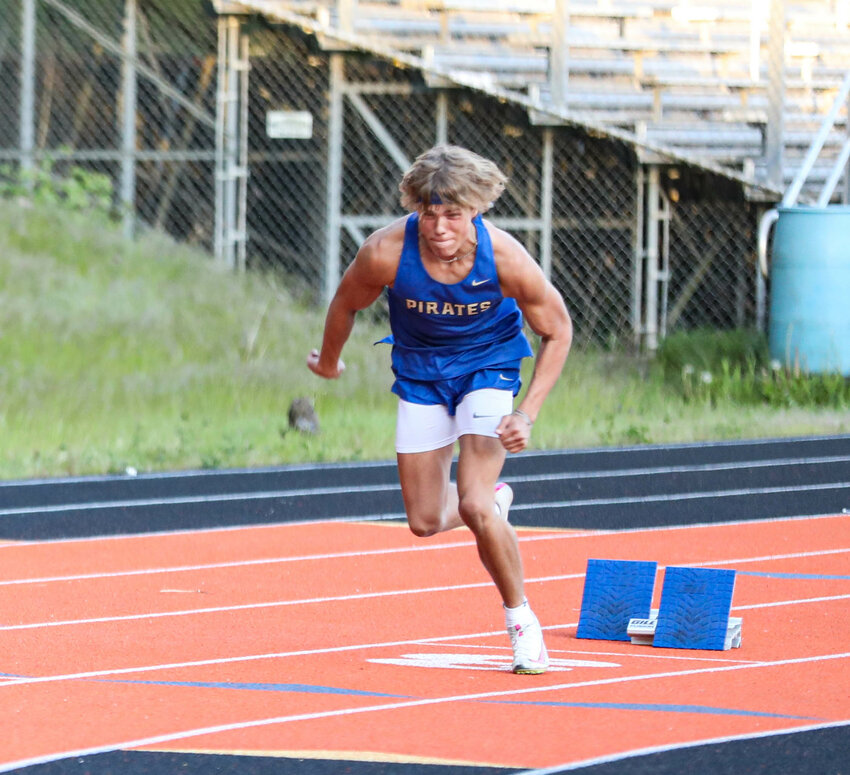 Adna's Tyler Price runs in the 200-meter dash during the C2BL Championships on Friday at Chinook Stadium in Kalama.
