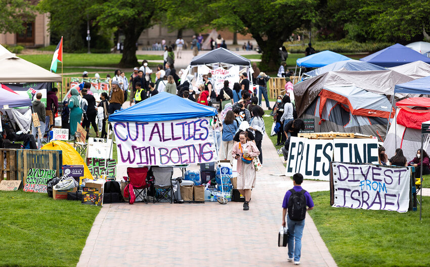 People convene inside of a &quot;liberated zone for Palestinian solidarity&quot; in the Quad at the University of Washington on Friday, May 3, 2024, in Seattle.