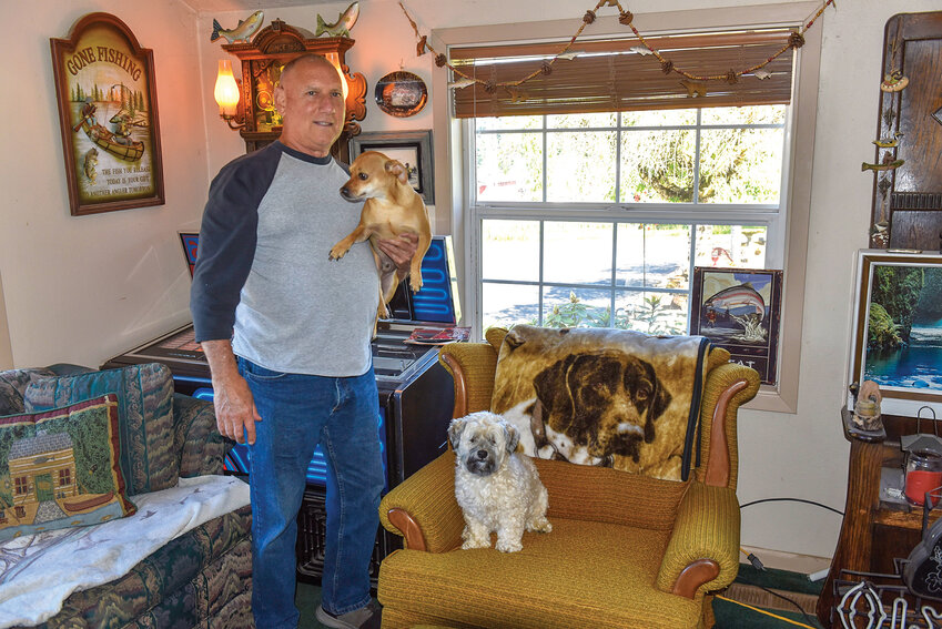In his retirement, Ridgefield&rsquo;s Dave Garrett takes special care of his dogs. Louis, a 3-year-old Chihuahua, and Oscar, a 7-year-old Havanese, can be a handful, but the experience is rewarding for Garrett.