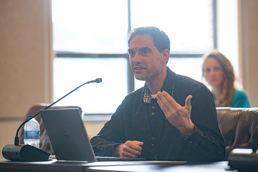 Cascade Community Healthcare nurse practitioner Ezra Foss gives a presentation at a Lewis County Board of Health meeting held at the Lewis County Courthouse on Monday, May 13.