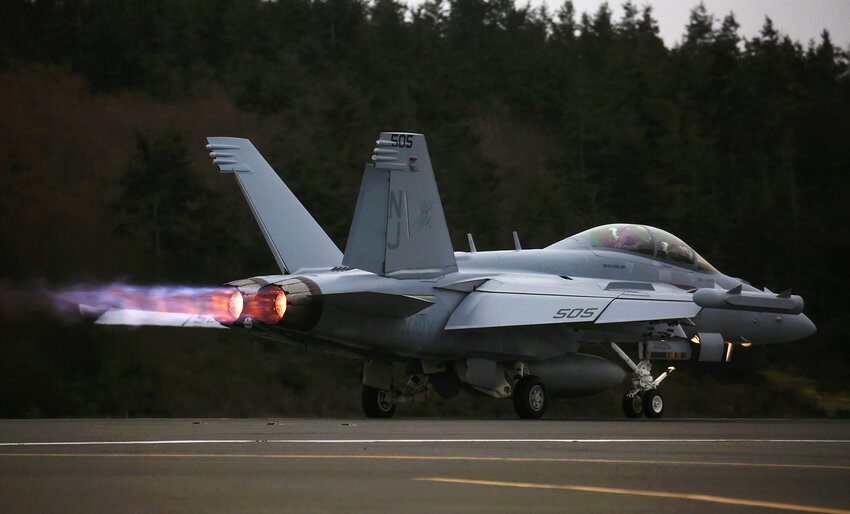 An EA-18G Growler engine's thrust with afterburner propels its takeoff with a loud roar from Naval Air Station Whidbey Island during an exercise, Thurs., March 10, 2016. Some Lopez Island residents are among those in the area upset with noise levels, which appear more bothersome from the past Prowler jets used by the Navy.