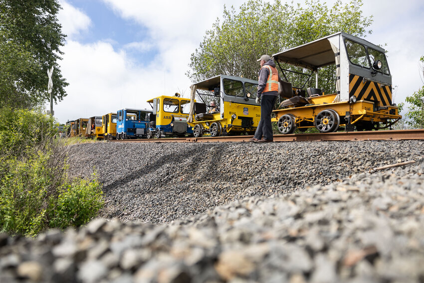 Railcars wait at the road for cars to cross on the Chehalis Centralia Railroad on Thursday, May 16.