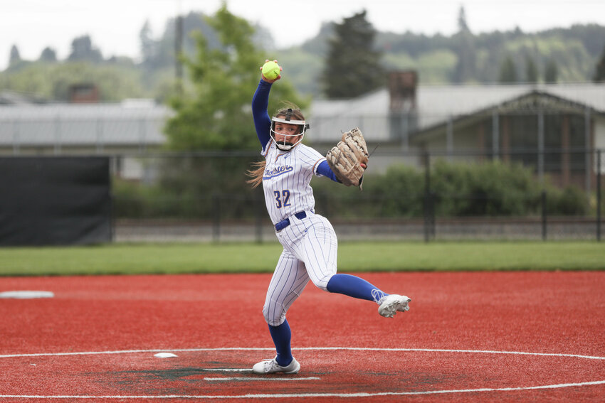 Rochester's Layna Demers throws a pitch during Rochester's 8-0 win over Ridgefield in a winner to state game at the 2A District 4 Tournament at Recreation Park in Chehalis on May 17.