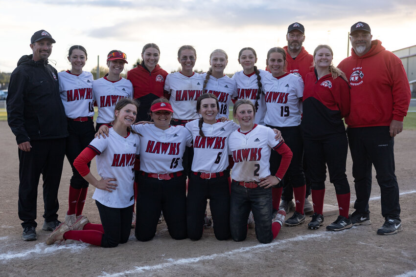 Toledo team members pose for a photo after winning a winner to state softball game at Fort Borst on Saturday, May 18.