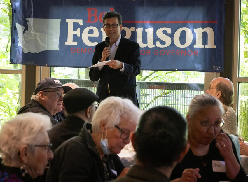 Supporters of Bob Ferguson, at top, enjoy shrimp at the annual shrimp feed fundraiser for Ferguson&rsquo;s gubernatorial campaign Sunday at the Northgate Community Center in Seattle.