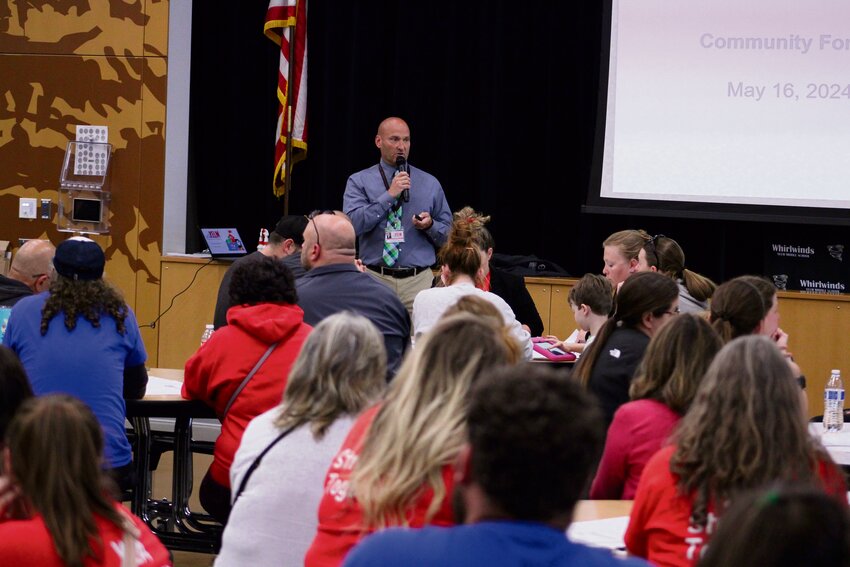Yelm Community Schools Superintendent Chris Woods hosts the district's community forum at Yelm Middle School on May 16.