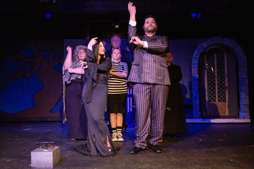 Cast members perform a dress rehearsal of &ldquo;The Addams Family&quot; at the Evergreen Playhouse in Centralia on Monday, May 20.