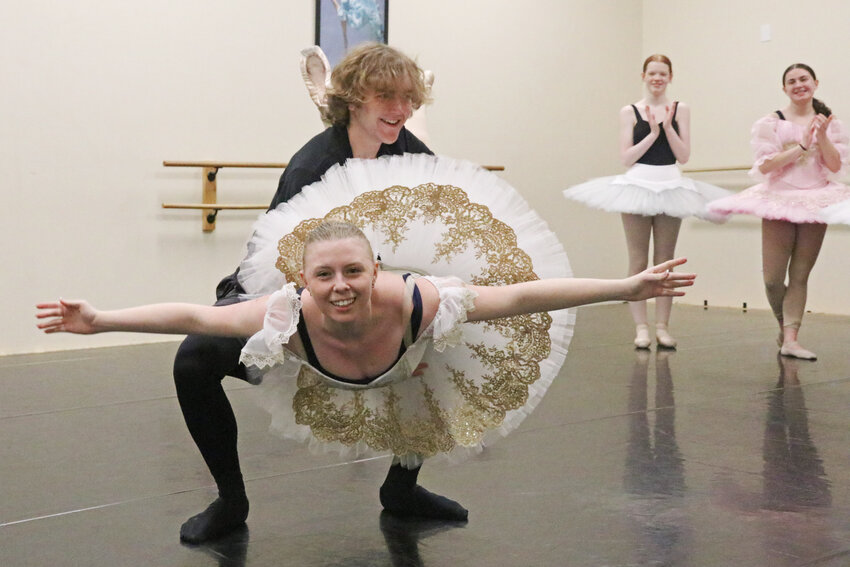 Owen Hedgers and McKenna Bryan practice a lift they perform as Prince D&eacute;sir&eacute; and Princess Aurora, while fellow dancers Kyleigh Lloyd and Eliza Wilmont applaud, during a &quot;Sleeping Beauty&quot; rehearsal at the Centralia Ballet Academy on Saturday, May 17.