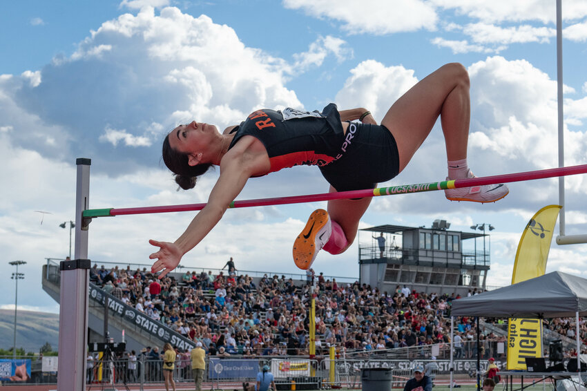 Rainier's Acacia Murphy high jumps during the State Track and Field Championships at Zaepfel Stadium in Yakima on Thursday, May 23.