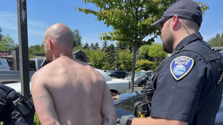 Olympia police arrested a 33-year-old man on May 15 on suspicion of committing third-degree assault against firefighters who responded to a car fire on April 24. The Olympia Police Department shared this photo in a social media post about the arrest.