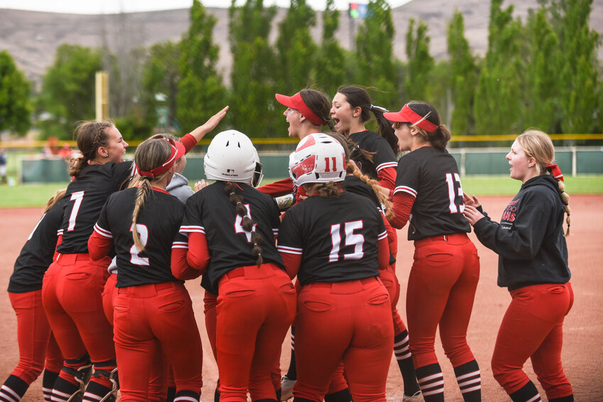 Toledo players celebrate a home run during the 2B softball quarterfinals at Gateway Sports Complex in Yakima on Friday, May 24.