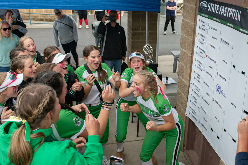 Ella Ferguson screams surrounded by teammates after the T-Birds 2A State quarter final win over Aberdeen at Carlon Park in Selah on Friday, May 24.