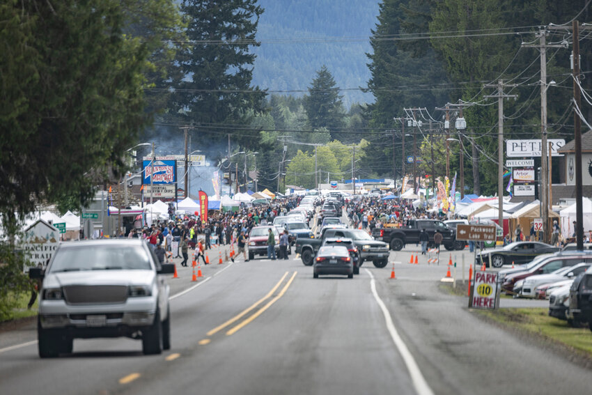Cars drive through the Packwood Flea Market on Memorial Day weekend on Sunday, May 26. The flea market, which began in the 1970s, started Friday and lasted through Monday. It is held twice a year, with the second market held on Labor Day weekend. The Packwood Flea Market is loosely organized and has no official host. It attracts thousands of people to the East Lewis County town each year.