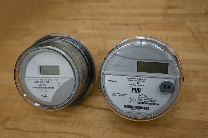 The Lewis County PUD's old meter, left, compared to the new advanced Honeywell meters crews continue to install. The PUD will install roughly 30,000 meters throughout the county, and hopes to complete the project by the end of this year.