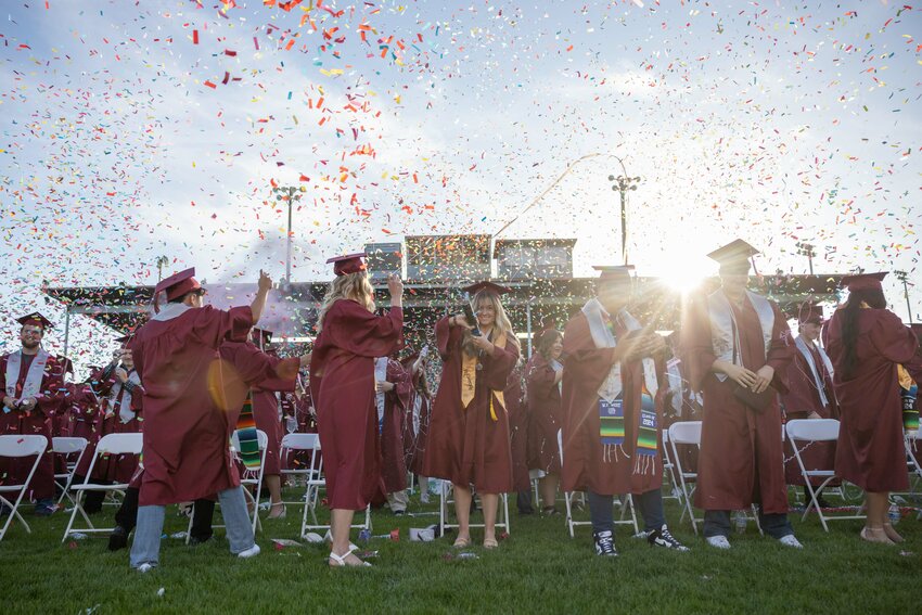 Graduates celebrate during the W.F. West High School graduation ceremony in Bearcat Stadium on Saturday, June 8.